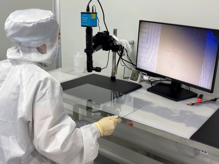 Measuring a panel under the microscope